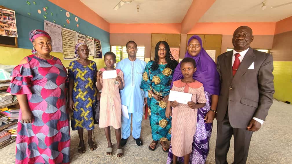 picture 2 Group photograph taken in the Head-teacher's office, Idera Nursery and Primary school, Ketu, Lagos State Nigeria.