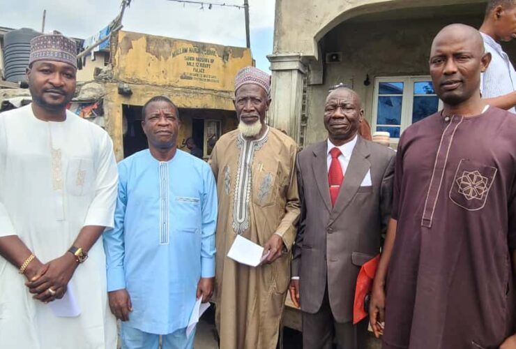 Group photograph taken with Alhaji Ibrahim Badamasi in Mile 12 Market, Lagos State Nigeria.